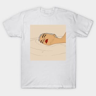 Girl lying in the water T-Shirt